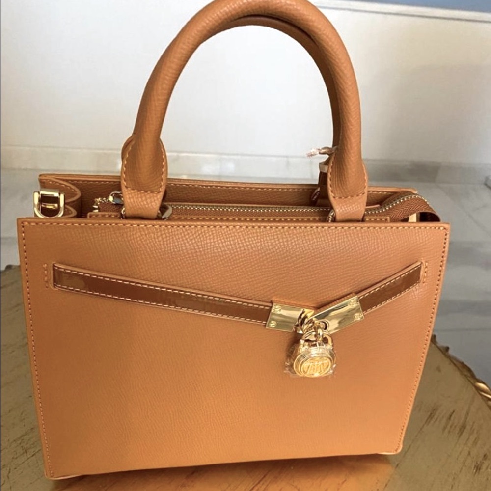 New 4 pockets  leather gold  Handbag .
